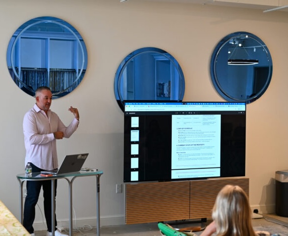 Adam Zell of Boston Automations teaching the AI for Designers class to interior designers and architects at the Boston Design Center, as featured in CE Pro Magazine