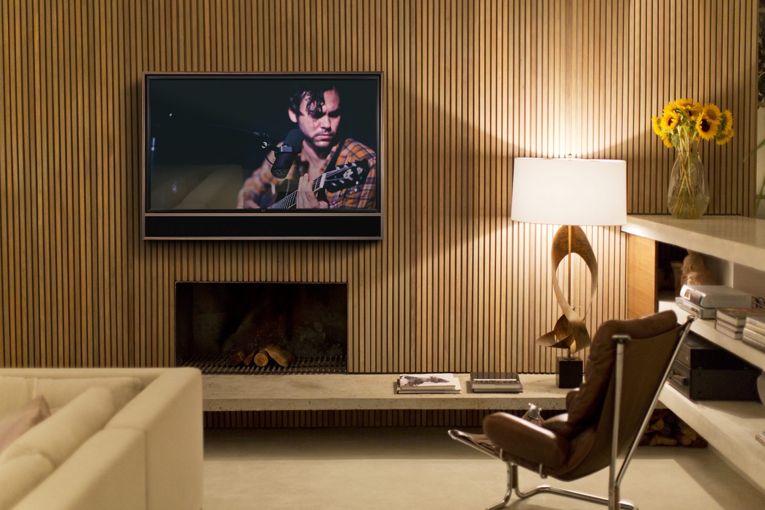 Leon Edge Media Frame in walnut framing a television to read as art on the wall