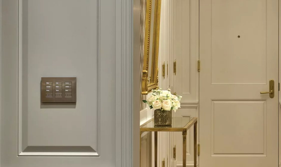 Palladiom keypad in metal finish in a hallway