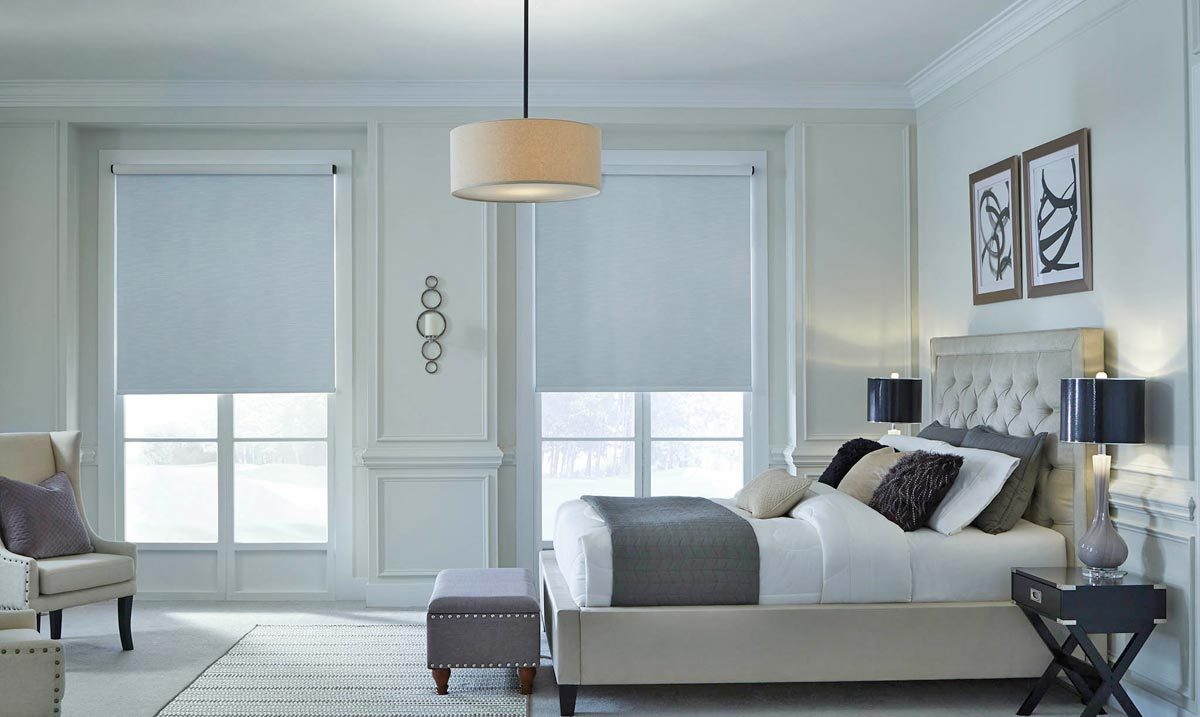 Palladiom motorized shade in a bedroom